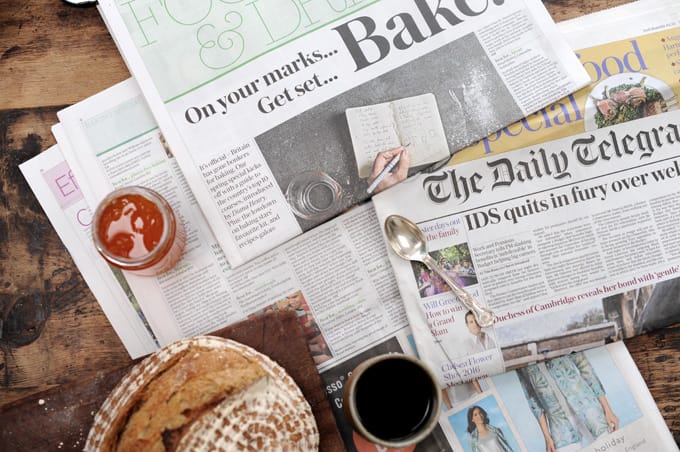 sourdough and coffee on The Telegraph newspaper