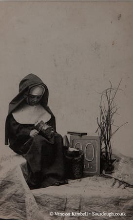 1922 – bread – nun – france 1922 – Nun with bread - France