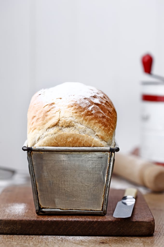 White bread loaf in a metal tin