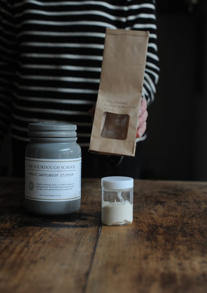 a photo showing Vanessa sharing my sourdough starter ready to travel with - How to Travel with a Sourdough Starter