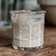 Sourdough starter in a glass jar on a wooden table. Acetic acid in sourdough