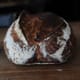 Retarded bread on the table in the bakery at Tartine that made retired bread famous Tartine bakery photo by Vanessa Kimbell baked with Richard Hart and Chad Robertson