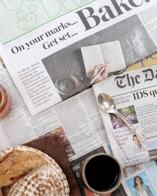 sourdough and coffee on The Telegraph newspaper