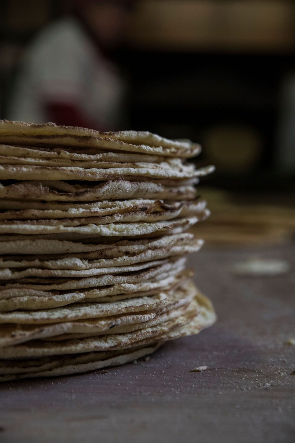 Closeup stack of flatbreads on a wooden table